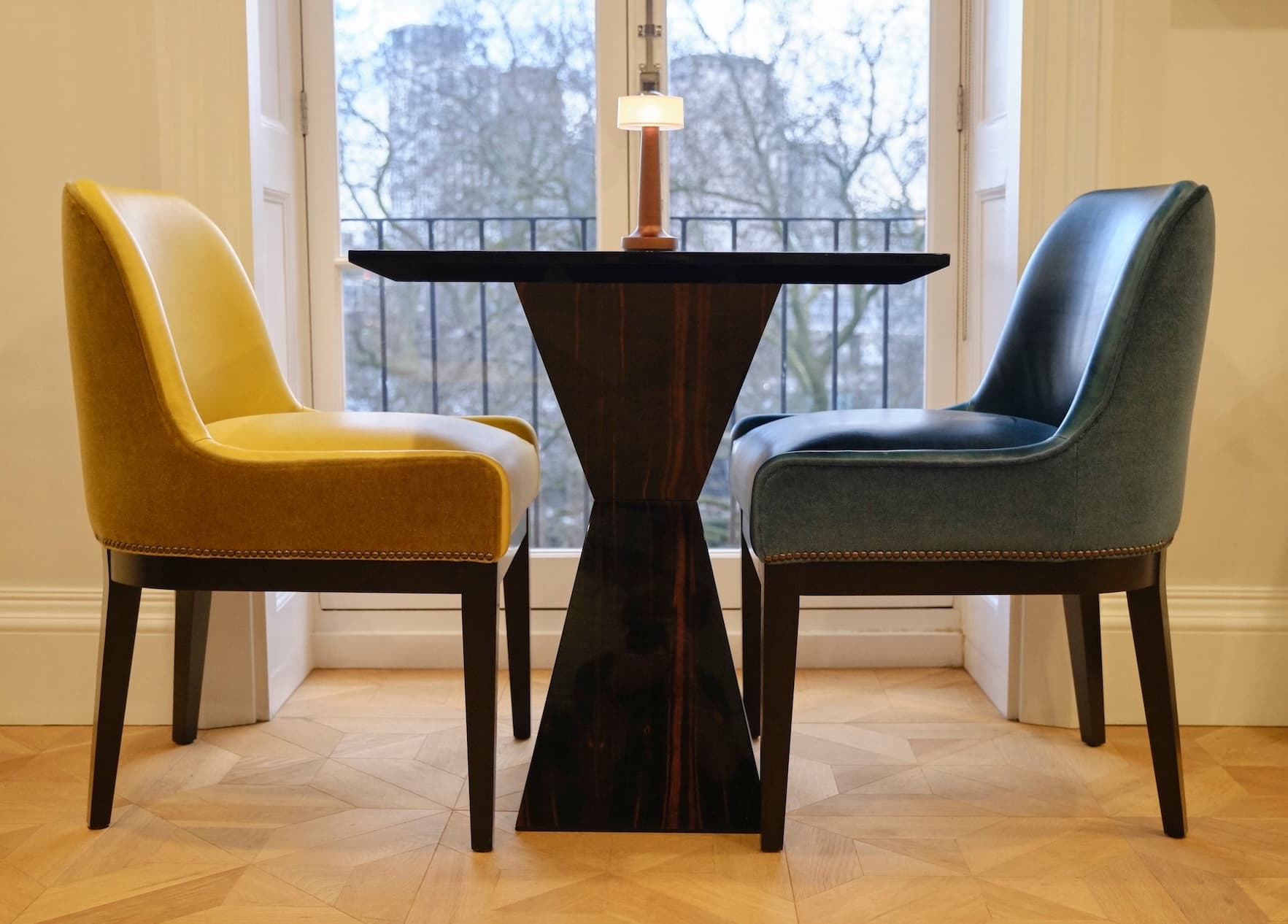 a close-up photo of well crafted wood side table with a leather top finish