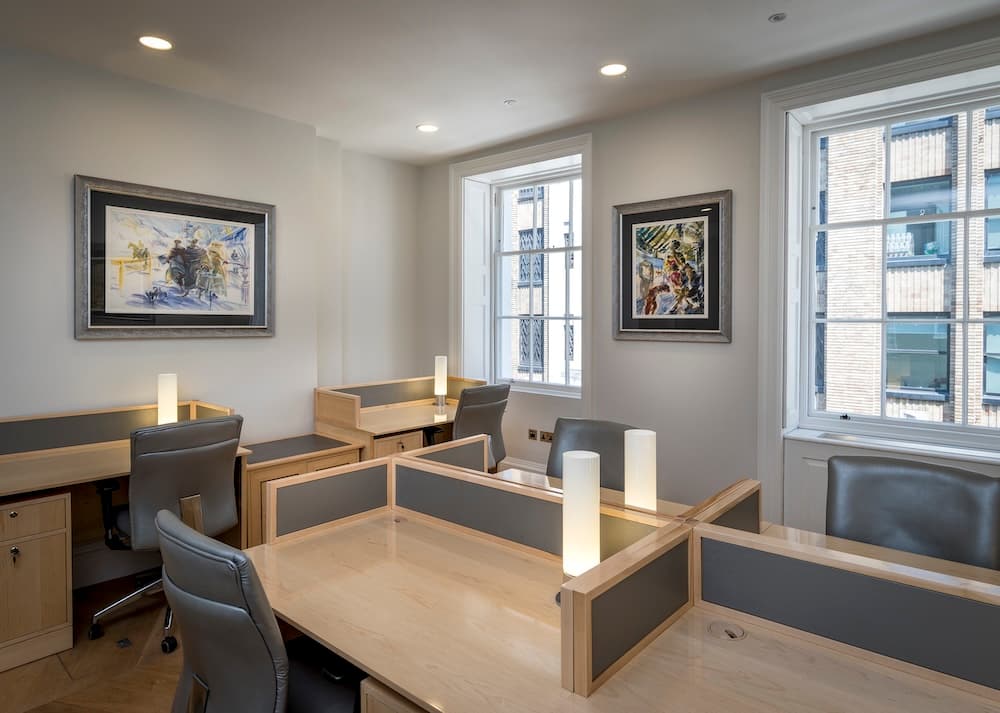 Private members' lounge with refined bespoke furniture and soft lighting